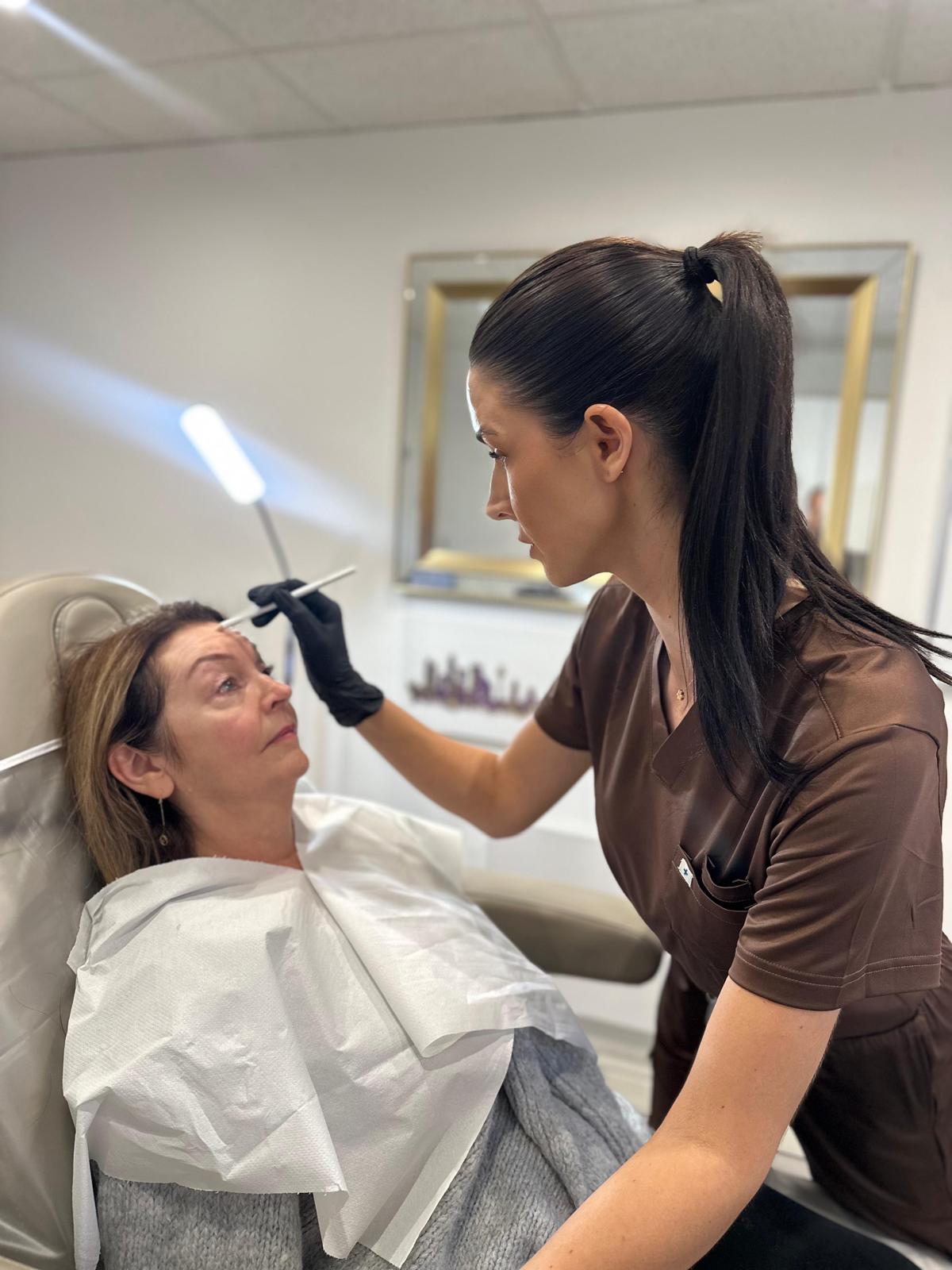 Jennifer preparing an anti-wrinkle treatment consultation